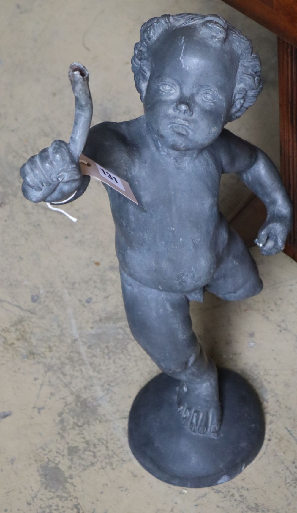 A Victorian lead putto garden fountain, height 68cm